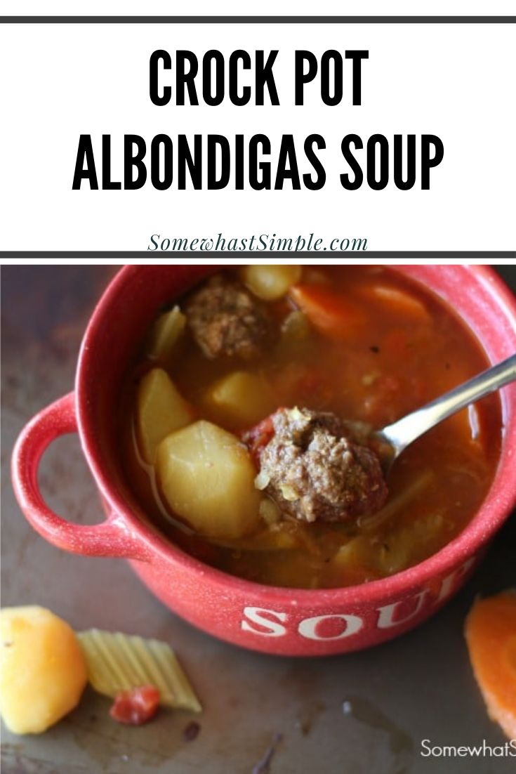 a bowl of crock pot albondigas soup with meatballs and potatoes