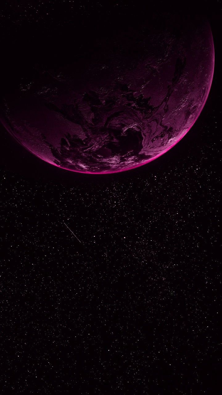 an image of a purple planet in the sky