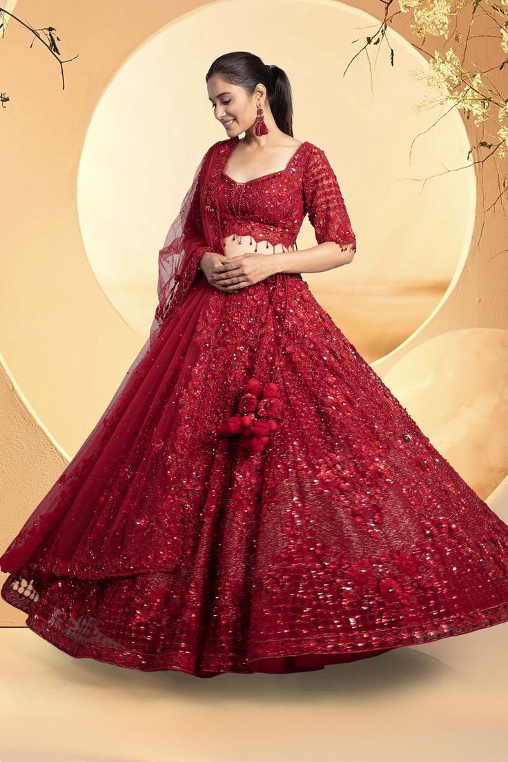 A vibrant red lehenga featuring tonal embroidery with intricate beadwork, sequins, and cutdana. This ensemble exudes elegance and sophistication. WASH CARE INSTRUCTIONS - Please Dry clean only when it is applicable! Ready to Ship! Red Bollywood Sharara With Sequins, Bollywood Style Red Sequined Sharara, Red Sequined Sharara With Traditional Drape, Bollywood Style Formal Lehenga With Sequins, Bollywood Style Formal Sequined Lehenga, Formal Anarkali Lehenga With Sequins, Elegant Red Lehenga With Sequins, Anarkali Style Formal Embroidered Choli, Formal Lehenga With Intricate Embroidery For Festivals