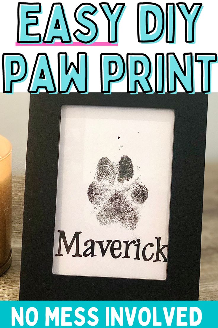 an easy diy paw print is displayed in front of a candle with the words, no mess involved