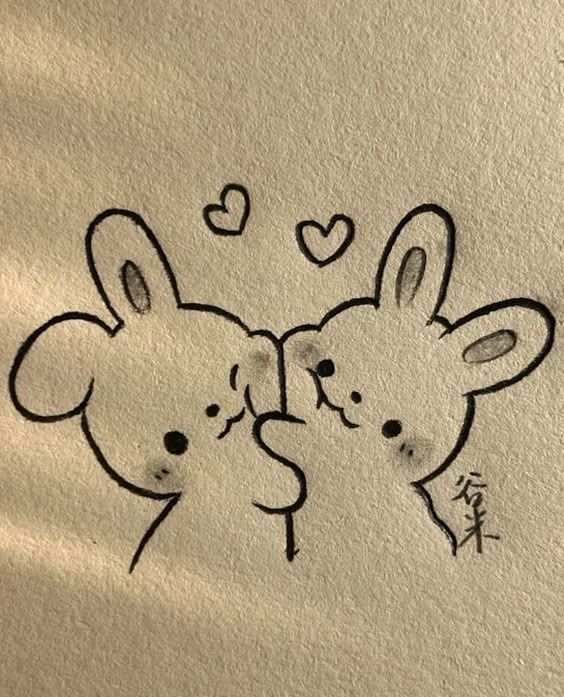 two mouses with hearts drawn on them