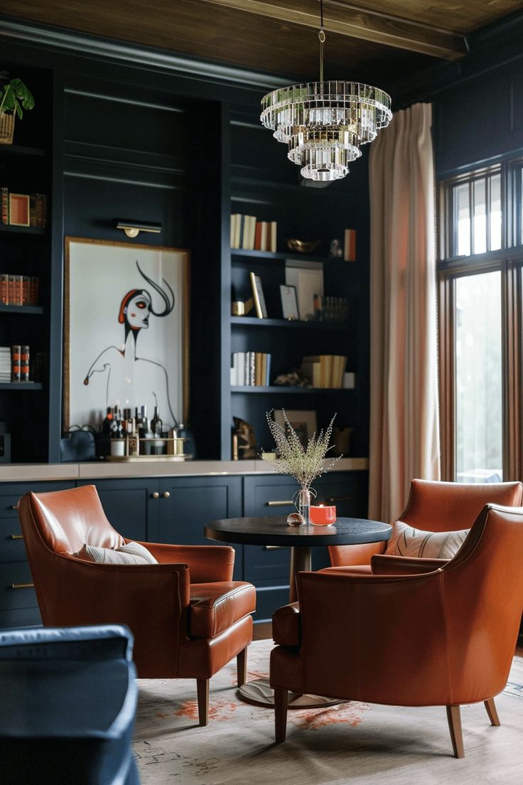 a living room filled with furniture and a chandelier