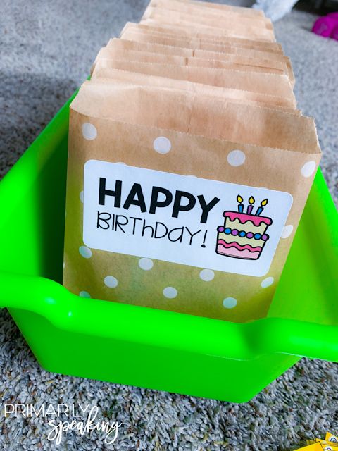 a birthday bag sitting on top of a green tray