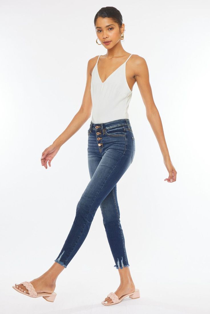 Our Jenny ankle skinny jeans are the perfect skinnies to add to your collection! Features beautiful fading, whiskering, a raw frayed hem with slight distress detail. These jeans also come with an elegant rose gold button fly and a regular 5 pocket design. Regular 5 pockets, Single button front closure, Zip fly 9.5" Rise / 27.5" Inseam (Size 5/26) 74% Cotton, 15% Polyester, 10% Rayon, 1% Spandex Model in size 25 Style # : KC9142D Stretchiness Level >> Stretch Flying Monkey Jeans, Stretchy Jeans, Jean Top, Skirt Leggings, Dress Romper, Perfect Match, Jeans Fit, Levi Jeans, High Rise