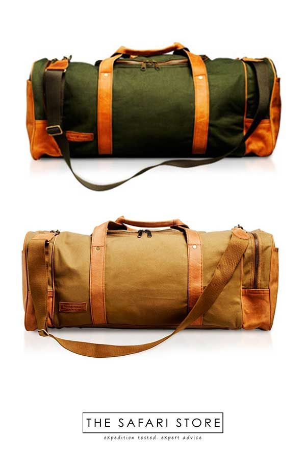 If you are looking for a soft-sided bag for safari, the Sandstorm Pioneer Safari Duffle Bag is a great choice for African travels. Made in Kenya from safari-grade cotton canvas and cowhide, this is a bag you will love and years for many years of adventure. Safari Luggage, Safari Clothes, Safari Hats, Safari Outfits, Leather Holdall, African Travel, Safari Shirt, Safari Hat, Suitcases