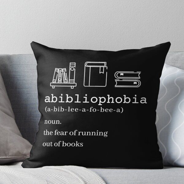 a black and white throw pillow with the words abidiopia on it, including books