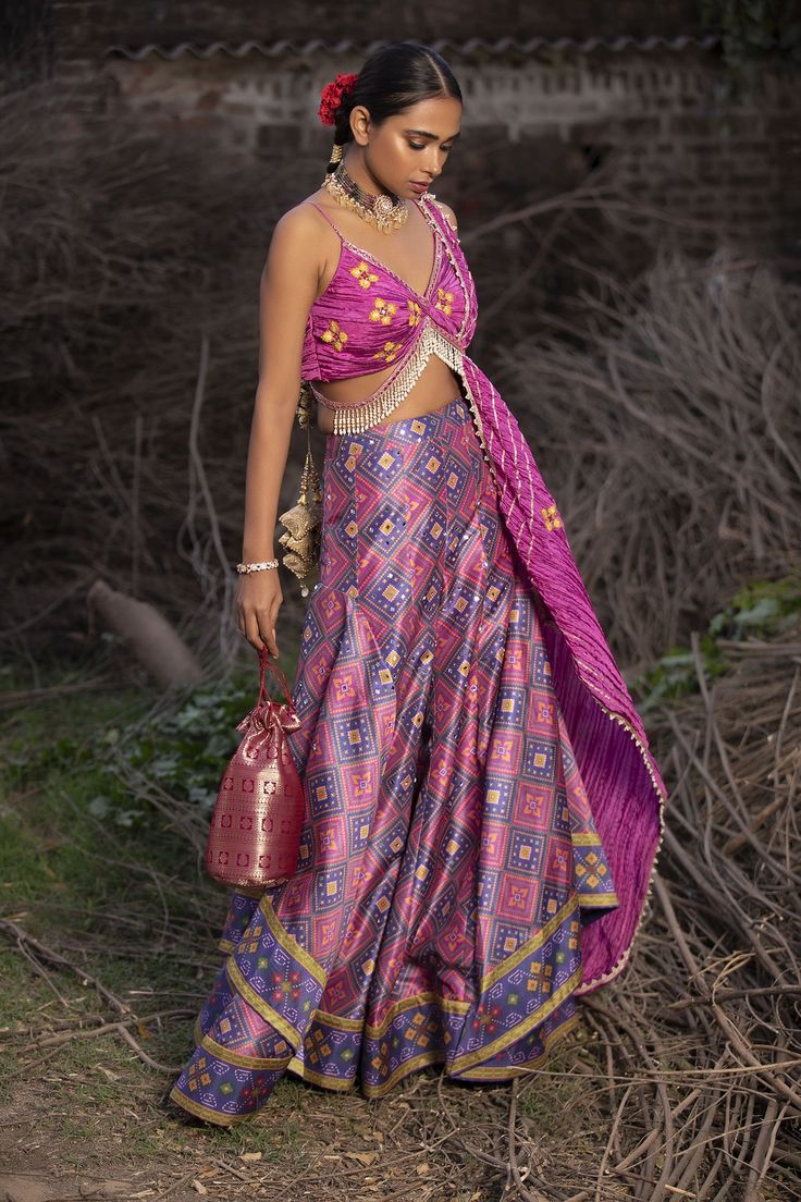 Pink and blue pure silk hand woven patola palazzo with twisted deep neck hand embroidered pink blouse. Paired twisted texture dupatta and potli bag.
Components:4
Pattern:Embroidered
Type of Work:Mirror, Resham
Neckline:V-neck
Sleeve Length:Sleeveless
Fabric:Palazzo: Banarasi; Blouse and Dupatta: Textured Silk
Color:Pink
Other Details:
Tassel hem blouse
Beaded hem blouse and dupatta
Back tie-up blouse
Layered palazzo
Comes with potli bag
Occasion:Destination Wedding - Aza Fashions Aditi Gupta, Banarasi Blouse, Potli Bag, Palazzo Set, Pink Mirror, Hem Blouse, Fashion App, Pink Blouse, Set For Women