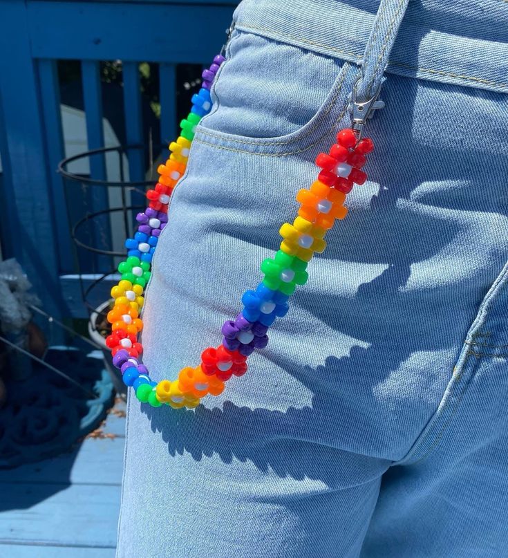 Rainbow Kandi Belt Chain! Good for aesthetics kidcore, clowncore, and some much more! Comes in two variations: - 24 flowers long  - 30 flowers long Kandi Lanyard, Weirdcore Accessories, Kandi Belt Chain, Rainbow Clothes Aesthetic, Clowncore Jewelry, Kidcore Diy, Kidcore Aesthetic Clothes, Flower Belt Chain, Kandi Shoes