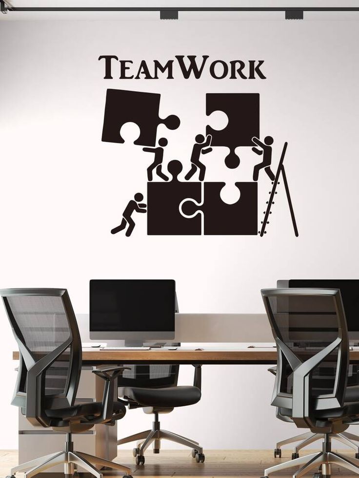 a wall decal with the words team work and people working on puzzle pieces in black