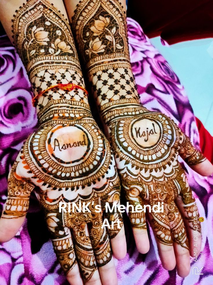 two hands with henna designs on them and the words, pink's mehndi