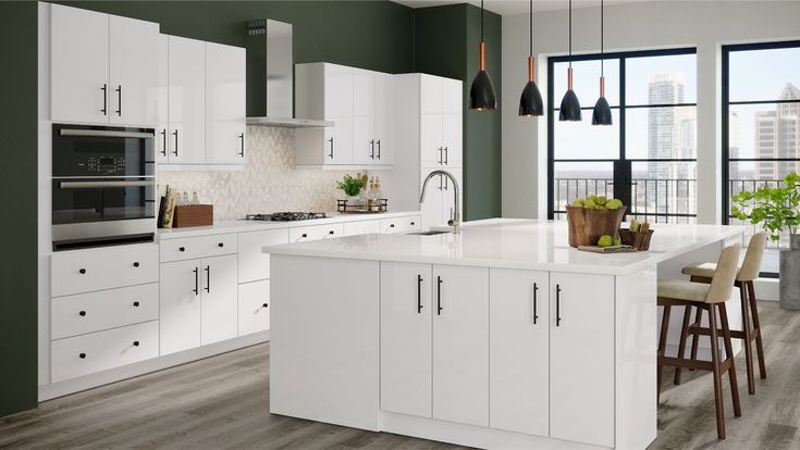 a kitchen with white cabinets and an island in front of a large window that overlooks the city