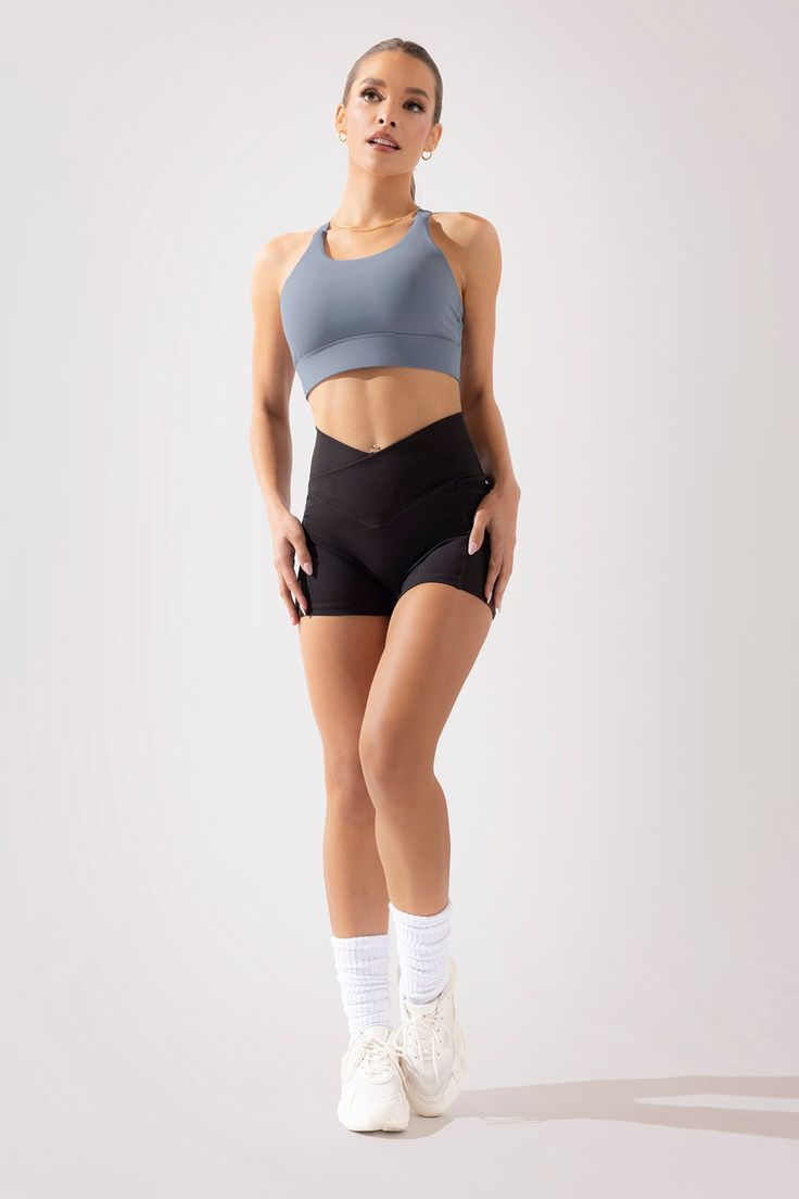 Versatile Sports Bra With Built-in Padding For Training, Compressive Gray Sports Bra For Running, Gray Compressive Sports Bra For Running, Supportive Stretch Sports Bra With Light Support, Compressive Sporty Gray Sports Bra, Gray Compressive Sports Bra For Workout, Compressive Gray Sports Bra, Supportive Workout Activewear With Built-in Bra, Sporty Supportive Seamless Activewear