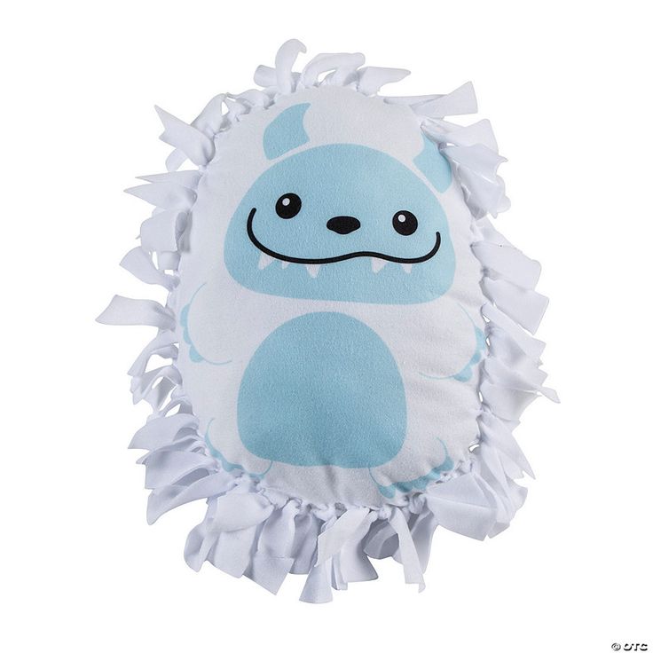 a blue and white stuffed animal on a white background