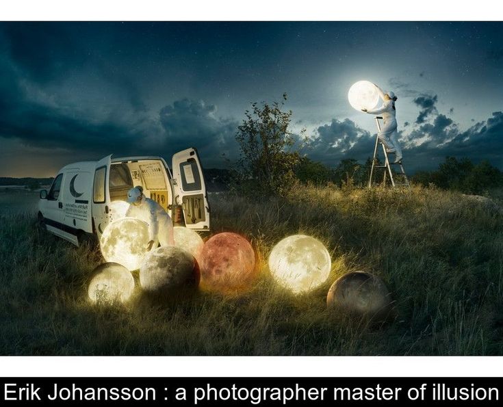 a man standing next to a white van on top of a lush green field under a full moon