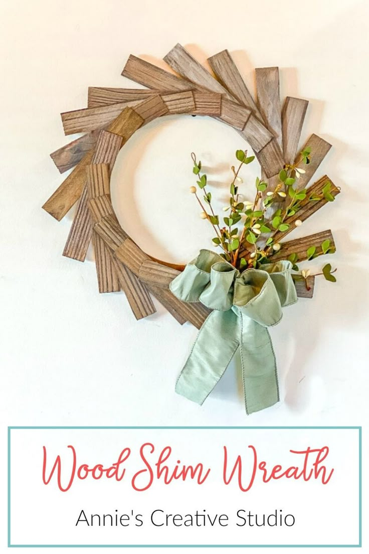 a wreath made out of wood and ribbon with the words, wood shim wreath annie's creative studio