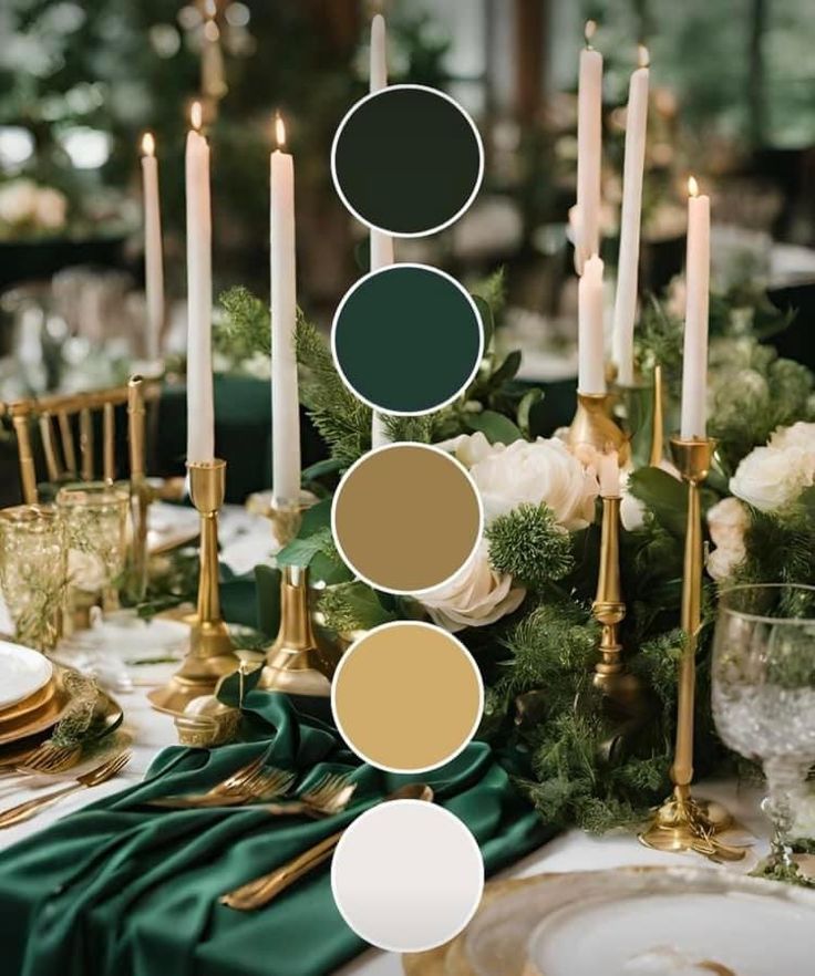 the table is set with candles, plates and green napkins on top of it