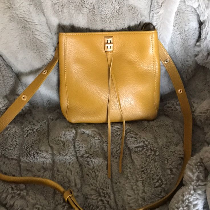 Beautiful New Small Darren Rebecca Minkoff Bag With Tags And Dust Bag. Comes With An Adjustable Strap For Crossbody Or Shoulder Wear. Top-Quality Leather Clasp Closure, Interior Has A Large Zipper Pocket Exterior Has A Large Open Pocket. Color Is Ambra Tan Bucket Shoulder Bag With Dust Bag, Tan Shoulder Bucket Bag, On-the-go Tan Shoulder Bag With Dust Bag, Tan Bucket Shoulder Bag With Removable Pouch, Tan Bucket Bag With Removable Pouch, Tan Crossbody Bucket Bag With Removable Pouch, Tan Pouch Bag With Removable Pouch, Tan Satchel Flap Bag With Adjustable Strap, Tan Pouch Bag With Detachable Strap