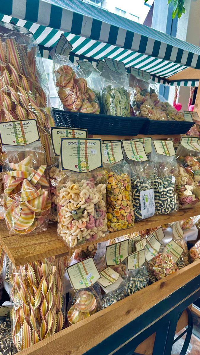 many different types of candy on display in a store