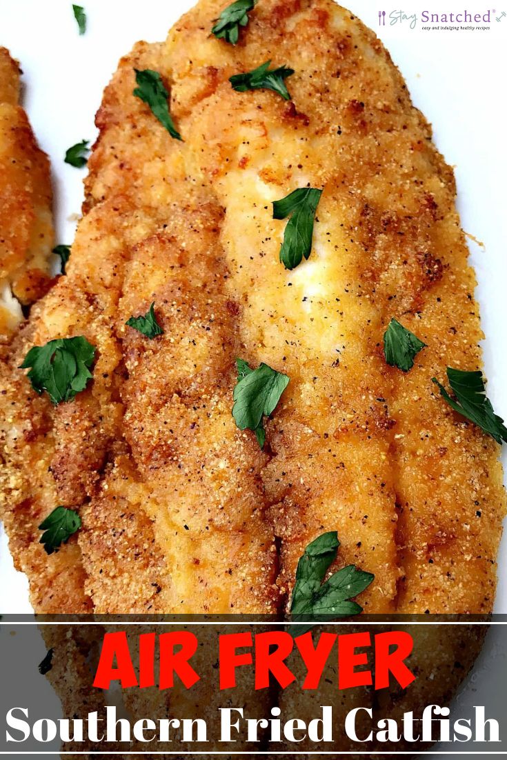 an air fryer fried fish fillet on a white plate with parsley sprigs