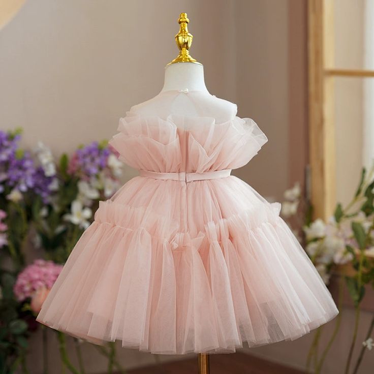 Expertly crafted from high-quality tulle, this Princess Round Tea Length Flower Girl Dress in Pink is perfect for any special occasion. Featuring a comfortable and stylish princess silhouette, back zip, and round neckline, this dress is embellished with elegant pleats and is ideal for weddings, baptisms, proms, and more. Complete the look with a pair of cute shoes for the perfect finishing touch. Tea Length Flower Girl Dress, Tea Length Tulle, Easter Dresses For Toddlers, Pink Tutu Dress, Vestidos Color Rosa, Pink Flower Girl Dresses, Girls Easter Dresses, Infant Flower Girl Dress