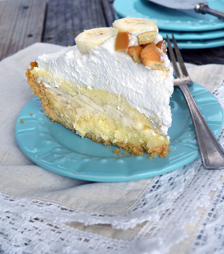 a slice of banana cream pie on a blue plate