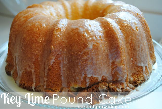 a bundt cake sitting on top of a plate covered in frosted icing