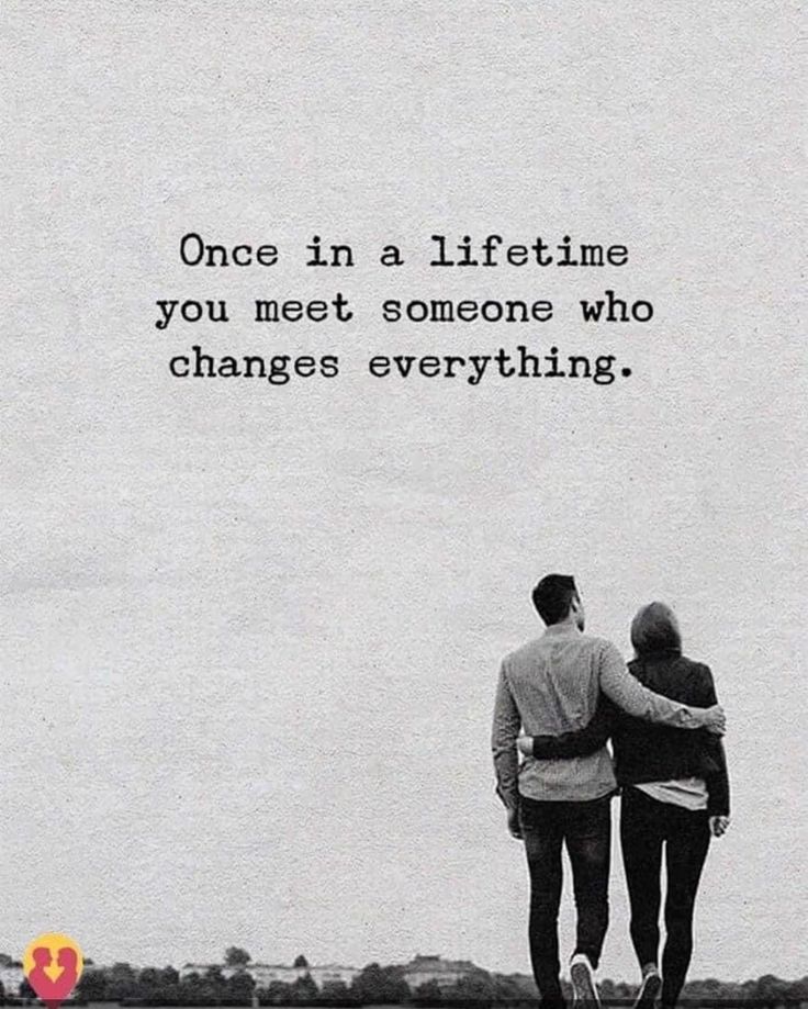 two people walking down the street with a quote on it that says, once in a lifetime you meet someone who changes everything