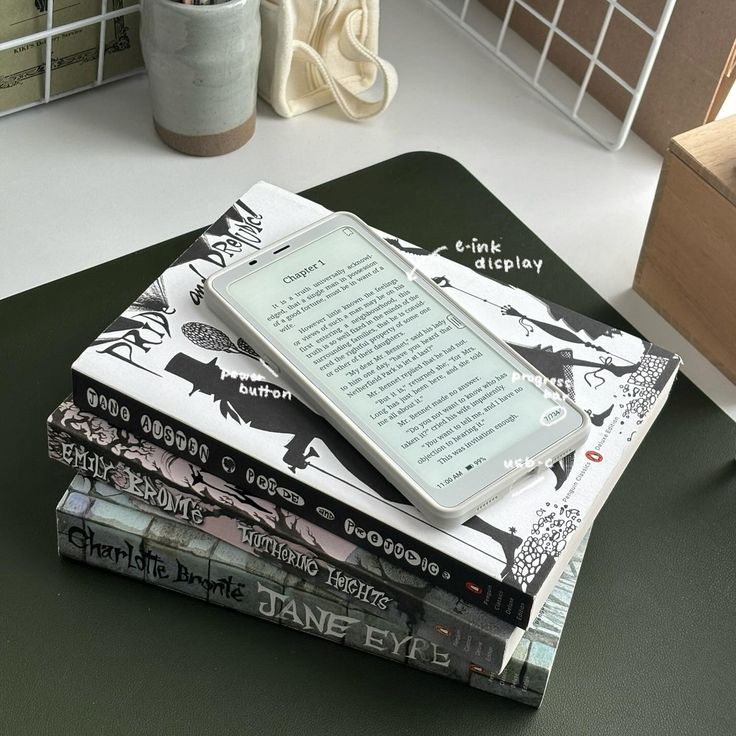 a stack of books sitting on top of a table