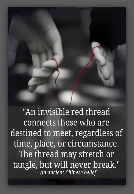 two hands touching each other with the words, an invisible red thread connects those who are destined