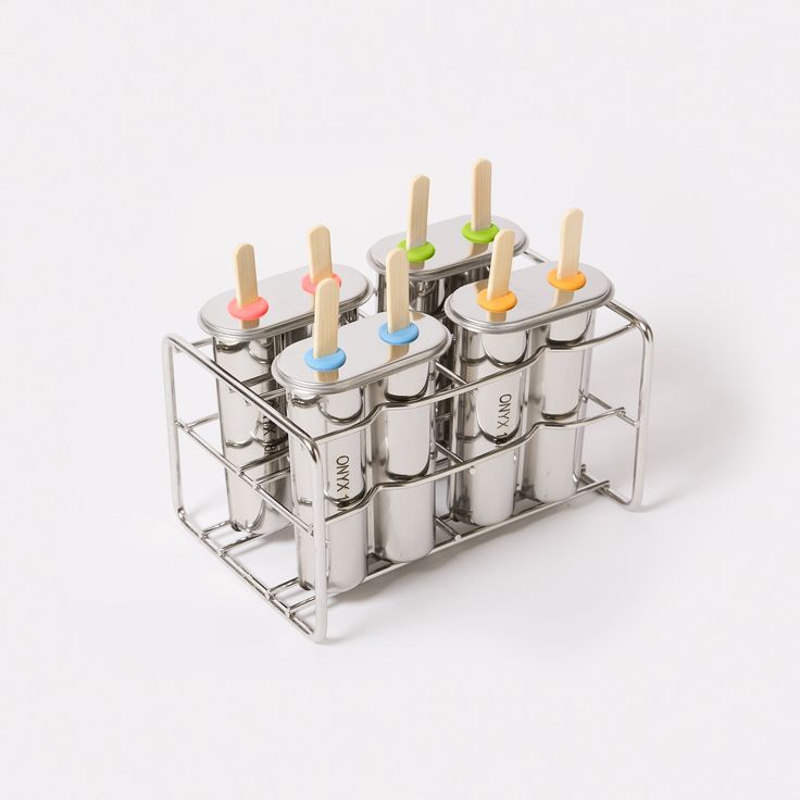 an ice cream holder with six popsicles in it