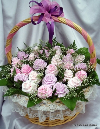 a basket filled with lots of pink flowers