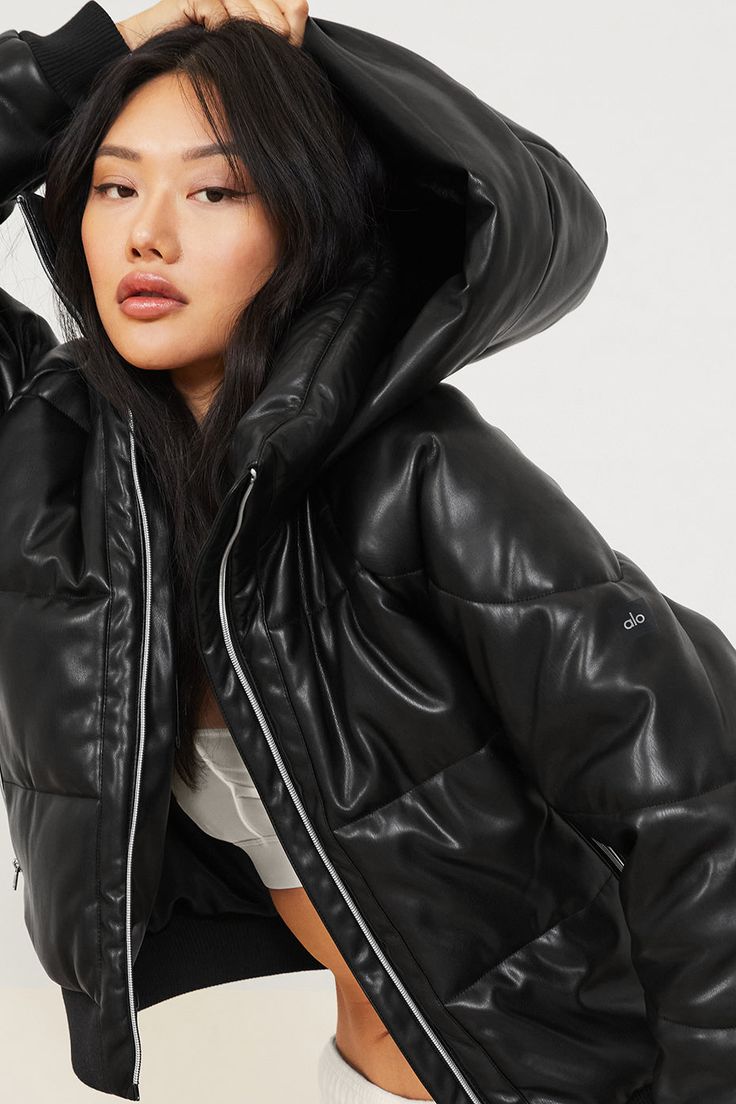 Make boss moves in the Faux Leather Boss Puffer. It’s cold-weather-approved and done in our luxe, buttery faux leather with satin lining for comfort and warmth. Zippered side pockets keep essentials secure and the classic, oversized fit makes it a must-have season after season. Luxe, buttery faux leather Satin lining Zippered side pockets & hidden internal pocket Designed & uniquely fit to flatter every size Wear-tested by our in-house team for the perfect fit Black Insulated Puffer Jacket For Cold Weather, Quilted Leather Puffer Jacket For Cold Weather, Black Functional Puffer Jacket With Zipper, Black Functional Puffer Jacket With Zipper Closure, Functional Black Puffer Jacket With Zipper, Black Nylon Puffer Jacket With Zipper Closure, Leather Puffer Jacket With Zipper For Winter, Leather Puffer Jacket With Zipper Closure For Winter, Leather Puffer Jacket For Winter