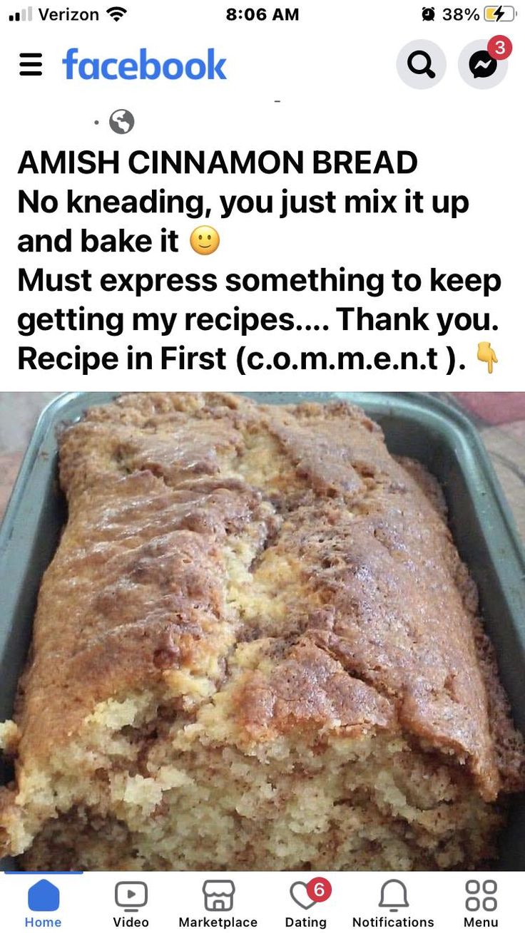 a loaf of bread sitting in a pan on top of a counter next to a facebook post