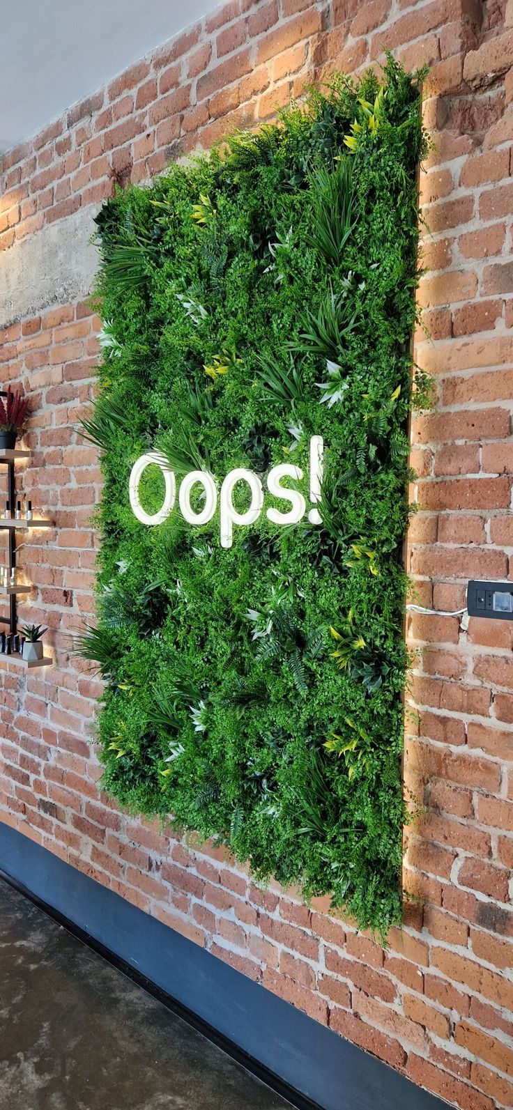 Brick Wall Office, Faux Green Wall, Fake Plant Wall, Green Wall Panel, Office Reception Design, Home Studio Ideas, Artificial Green Wall, Smoothie Shop, Artificial Plant Wall