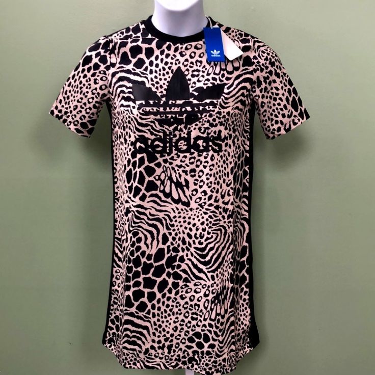 Nwt Adidas T-Shirt Dress Animal Print Size Xs Measurements Are Approximate And On Flat Surface (Inches) Shoulder: 14.5" Bust: 18" Length: 34" Sleeves: 9.5" White Crew Neck T-shirt Dress With Graphic Print, White Graphic Print T-shirt Dress With Crew Neck, Casual Cotton Dresses With All Over Print, Spring Streetwear Dress With Crew Neck, White Graphic Print T-shirt Dress For Spring, Spring White Graphic Print T-shirt Dress, Black Graphic Print Short Sleeve Dress, Casual Black Printed Mini Dress, Casual Fitted Dresses For Streetwear