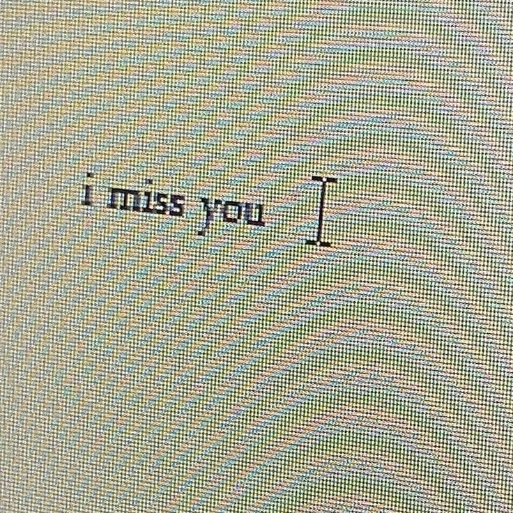 the words i miss you written on a screen