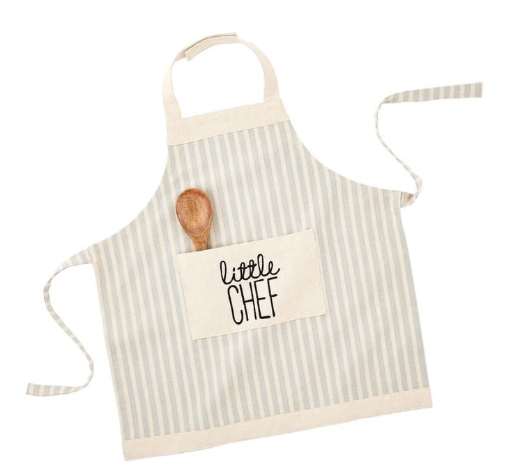 a little chef apron with a wooden spoon in it and a name tag on the front