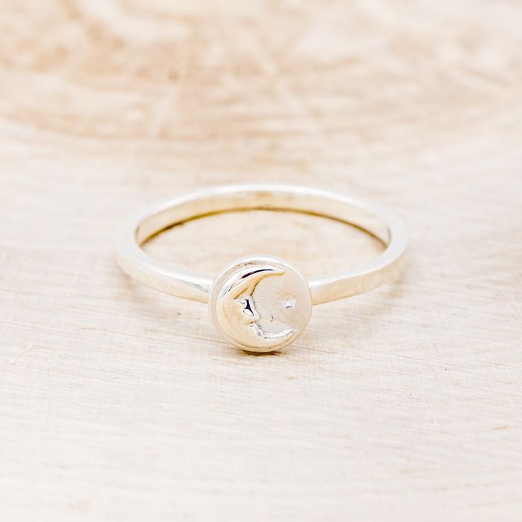 Product Details Ring Style: A celestial-style ring featuring a crescent moon and a star. This ring is pictured in silver. Width: The width of the ring pictured is approximately 2mm wide. Top Dimension: 7.34 mmx7.34 mm Available In: Silver, 14K White Gold, 14K Yellow Gold, 14K Rose Gold Each of our rings is a one-of-a-kind piece and is made to order for you and your significant other by a passionate and skilled artisan. | Celestial Ring Featuring A Crescent Moon & A Star - by Staghead Designs - S Celestial Stackable Promise Rings, Silver Star-shaped Celestial Midi Rings, Celestial Style Stackable Rings As Gift, Adjustable Moon Shaped Celestial Rings, Adjustable Moon-shaped Celestial Rings, Celestial Silver Star Midi Rings, Celestial Open Ring With Moon Charm, Adjustable Moon Charm Promise Ring, Celestial Moon Midi Rings As Promise Ring