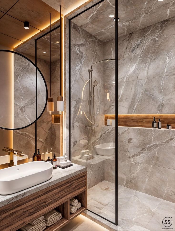 a modern bathroom with marble walls and flooring