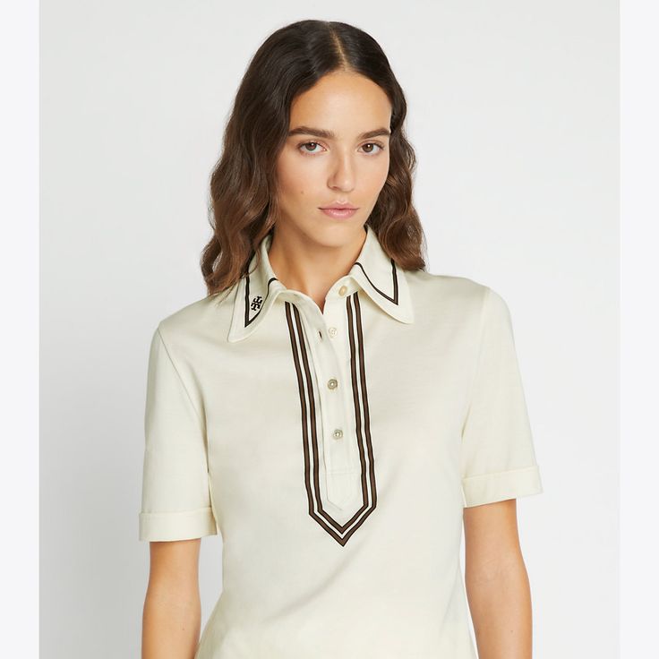 A classic polo is reimagined with a '70s influence. Crafted in lightweight mercerized cotton, the collared top is designed for wearing on and off the green. Collared Top, Designer Tops, Handbag Shoes, Swim Accessories, New Handbags, Designer Outfits Woman, Italian Leather, Sports Women, Women Empowerment