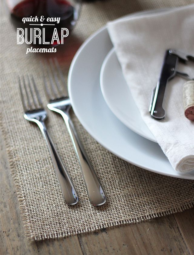 a plate with silverware and napkins on it