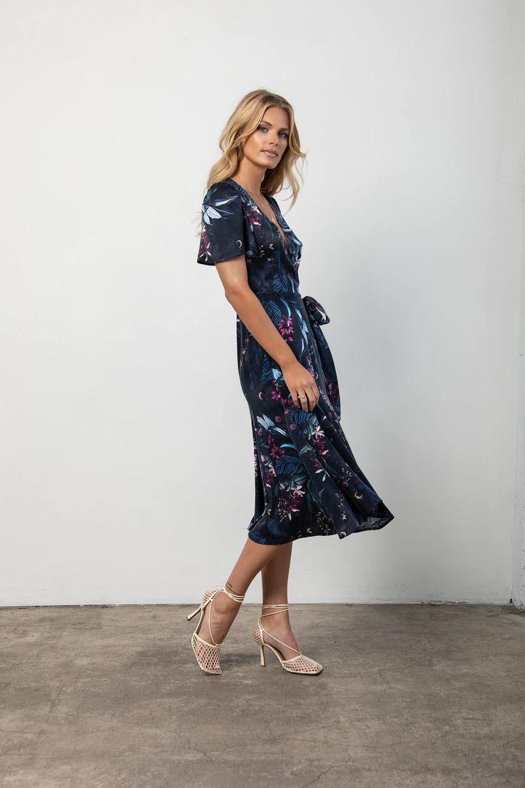 Wrap yourself in soft silk with our Lily wrap dress. No fuss- just easy, comfortable and high on style. Made in two custom prints, Midnight Floral and Palm. 100% silkDry Clean Only Model is 5'9" and wearing a size small Flowy Wrap Dress With Surplice Neckline For Brunch, V-neck Rayon Midi Dress With Tie Waist, Elegant Floral Print Wrap Maxi Dress, Flowy Wrap Dress For Brunch, Flowy Wrap Dress For Date Night, Elegant Wrap Dress With Floral Print And Surplice Neckline, Elegant Floral Wrap Dress With Surplice Neckline, Summer Flowy Faux Wrap Dresses, Flowy Faux Wrap Summer Dress