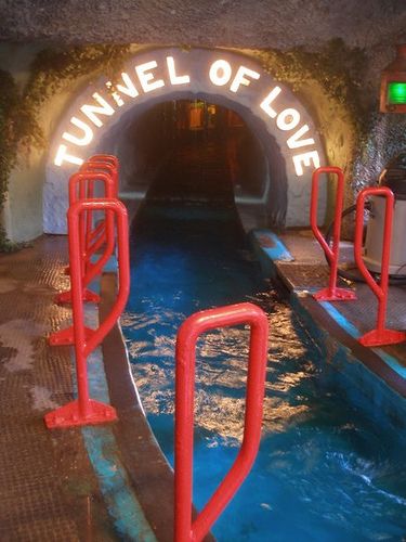 the tunnel of love is located at the entrance to the park