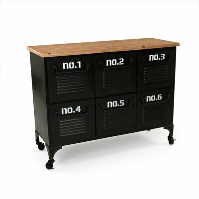 a black metal cabinet with four drawers and wooden top