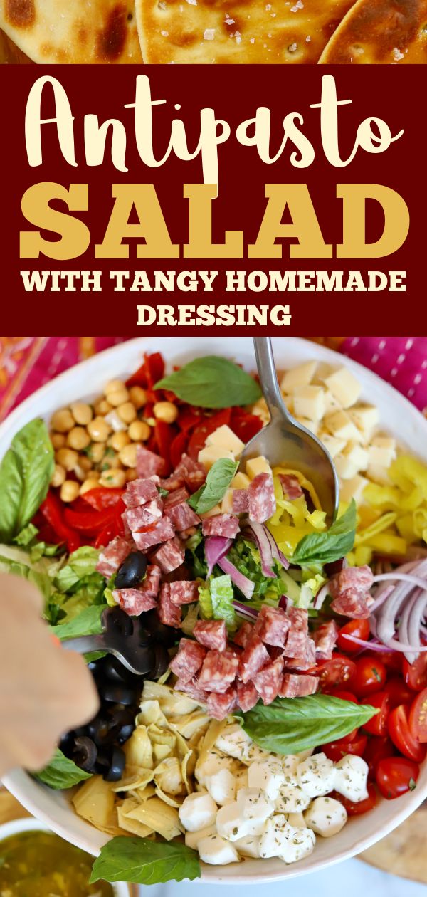 an image of a salad in a bowl with text overlay that reads antipaste salad with tangy homemade dressing