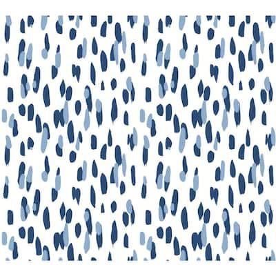 an abstract blue and white background with black dots