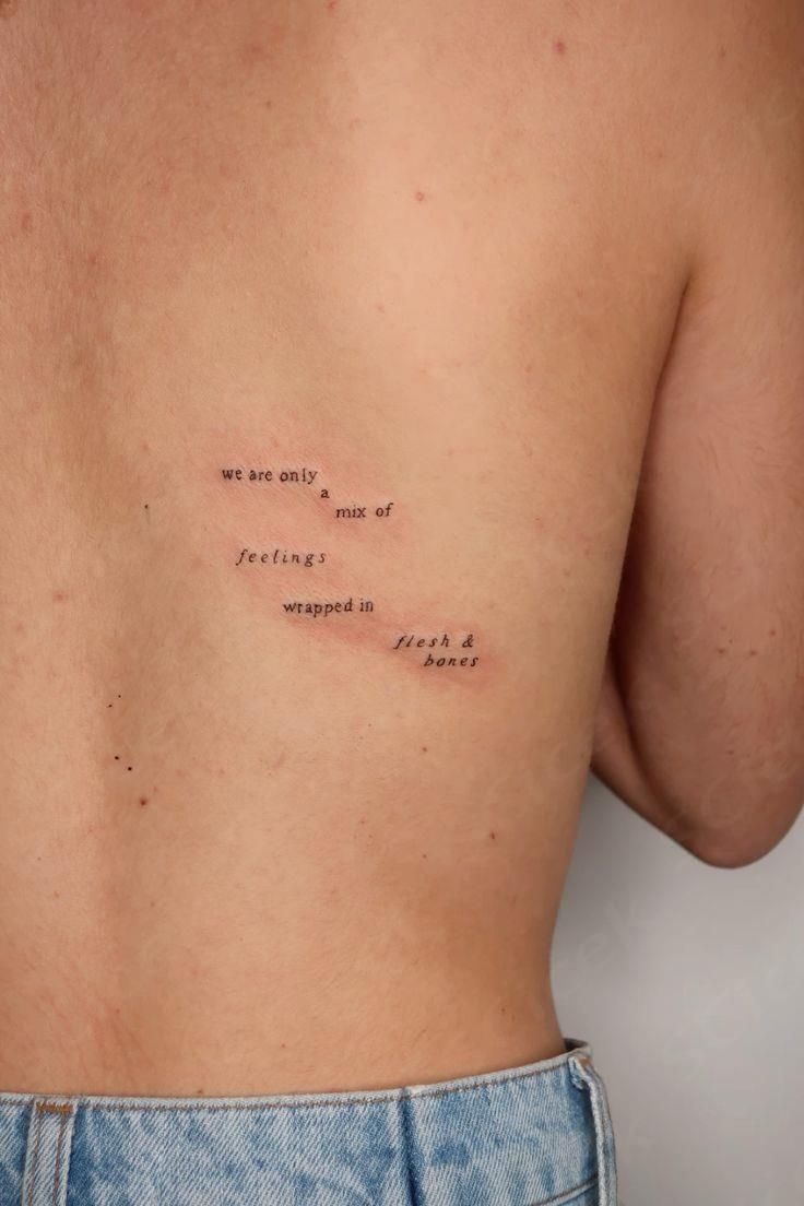 the back of a woman's chest with an inscription on it that says, you are