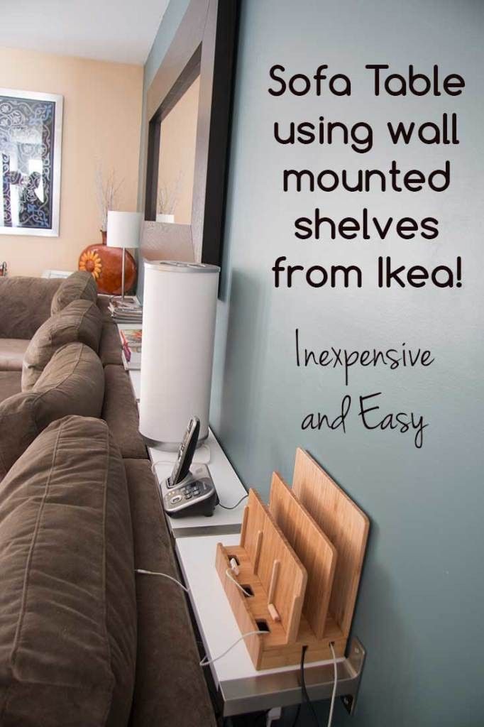 a living room with couches, lamps and a quote on the wall that says sofa table using wall mounted shelves from ikea