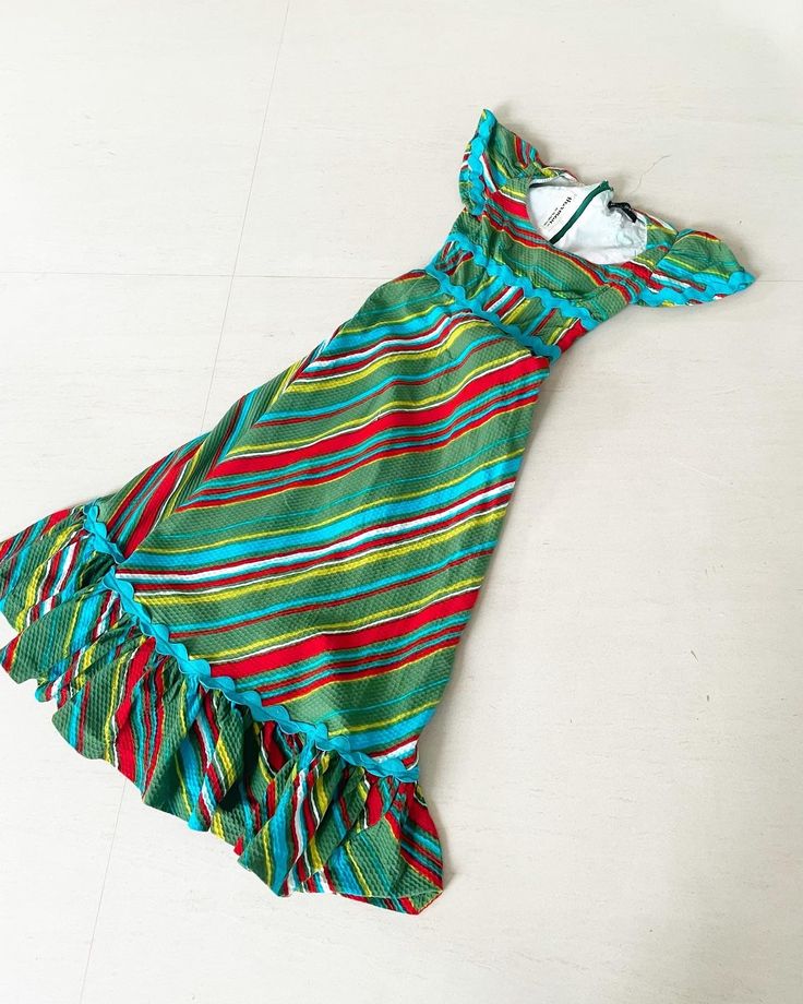 "Waffle cotton maxi rainbow dress with ric rac trim! Really, do I need to say anymore? This 70s piece is a true beauty. Back zip Condition: Excellent Label: Harmay, Lord & Taylor Bust 33/34\" Waist 25/26\" Hips 47\" Length 52\" This has been professionally cleaned and is ready to wear. Comes from a smoke and pet free home. Don't forget to follow me on Instagram @tammaraclearshercloset for new listing alerts. This is shipping from Singapore. Standard post to the US takes about 10 working days Vintage Multicolor Maxi Dress For Vacation, Multicolor Vintage Maxi Dress For Vacation, Retro Cotton Maxi Dress, 1970s Multicolor Cotton Dress, Vintage Green Cotton Maxi Dress, Green Vintage Cotton Maxi Dress, Toothpaste Kisses, 70s Rainbow, Funky Clothes