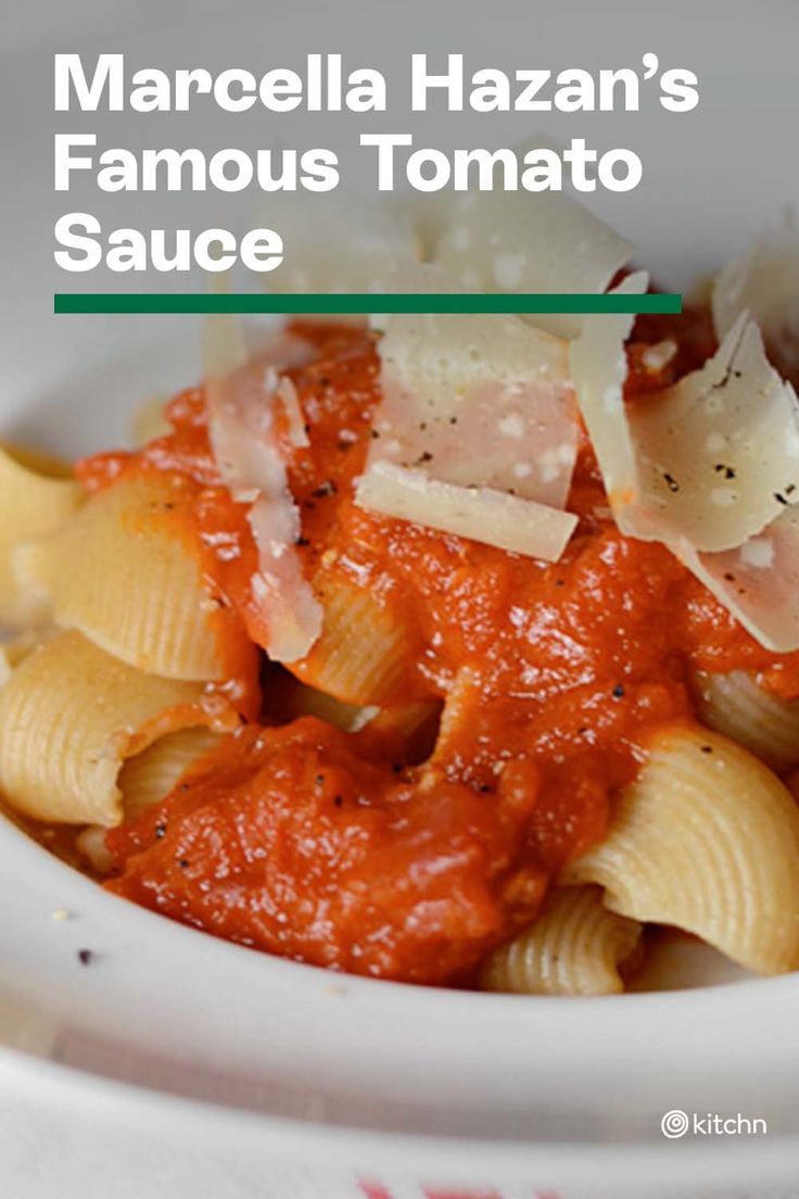 a white bowl filled with pasta and sauce